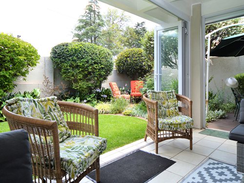 view of garden from patio - open doors (3)